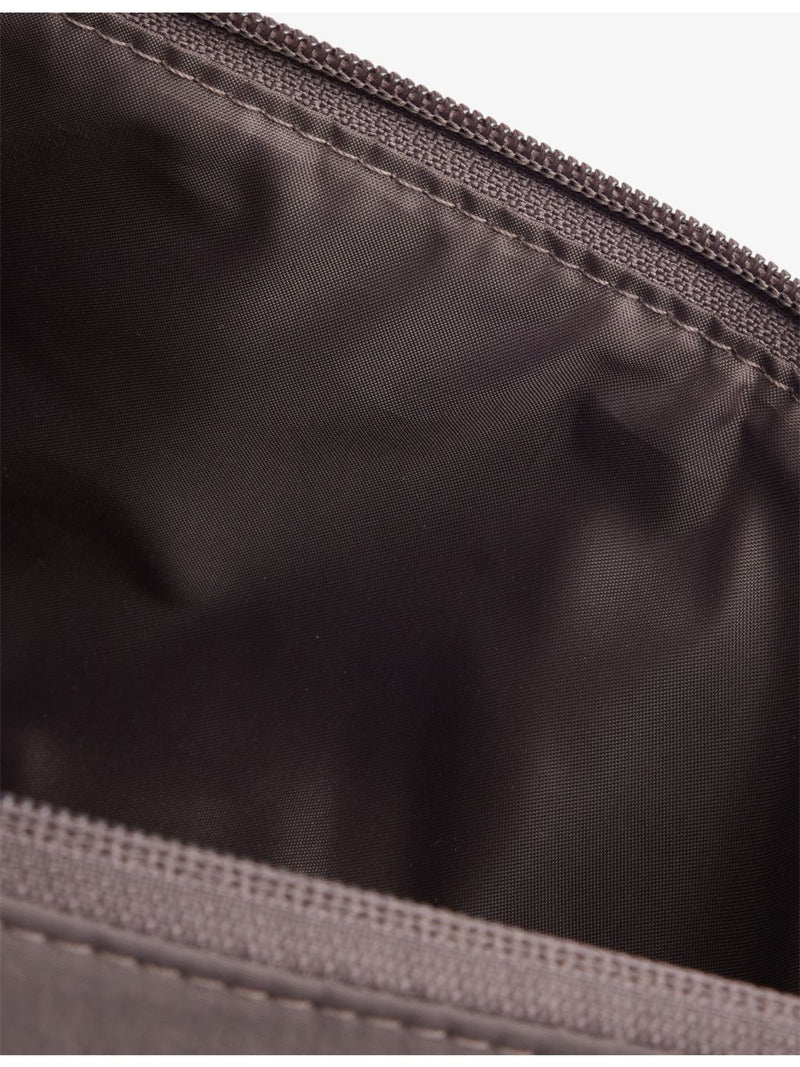 Gymshark pleat nylon crossbody bag with adjustable strap, UK version