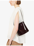 Neous Pardalis leather bucket bag with shoulder strap, UK version