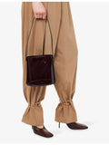 Neous Pardalis leather bucket bag with shoulder strap, UK version