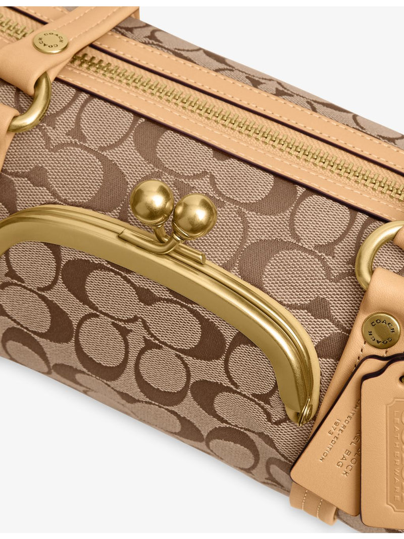 Coach canvas barrel shoulder bag, imported from the UK