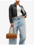 Coach Kisslock 28 suede barrel bag, imported from the UK