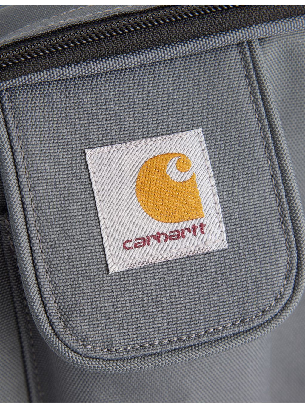 Carhartt WIP small woven cross-body bag, imported from the UK