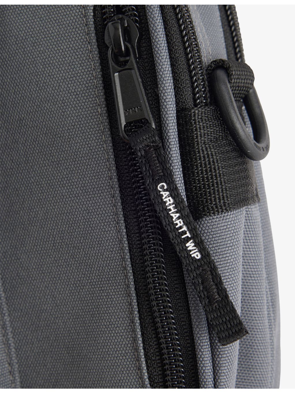 Carhartt WIP small woven cross-body bag, imported from the UK