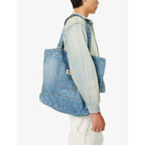 Carhartt WIP logo-patch paint-splatter denim tote, imported from the UK