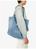 Carhartt WIP logo-patch paint-splatter denim tote, imported from the UK