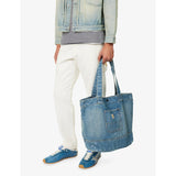 Carhartt WIP logo-patch paint-splatter denim tote, imported from the UK