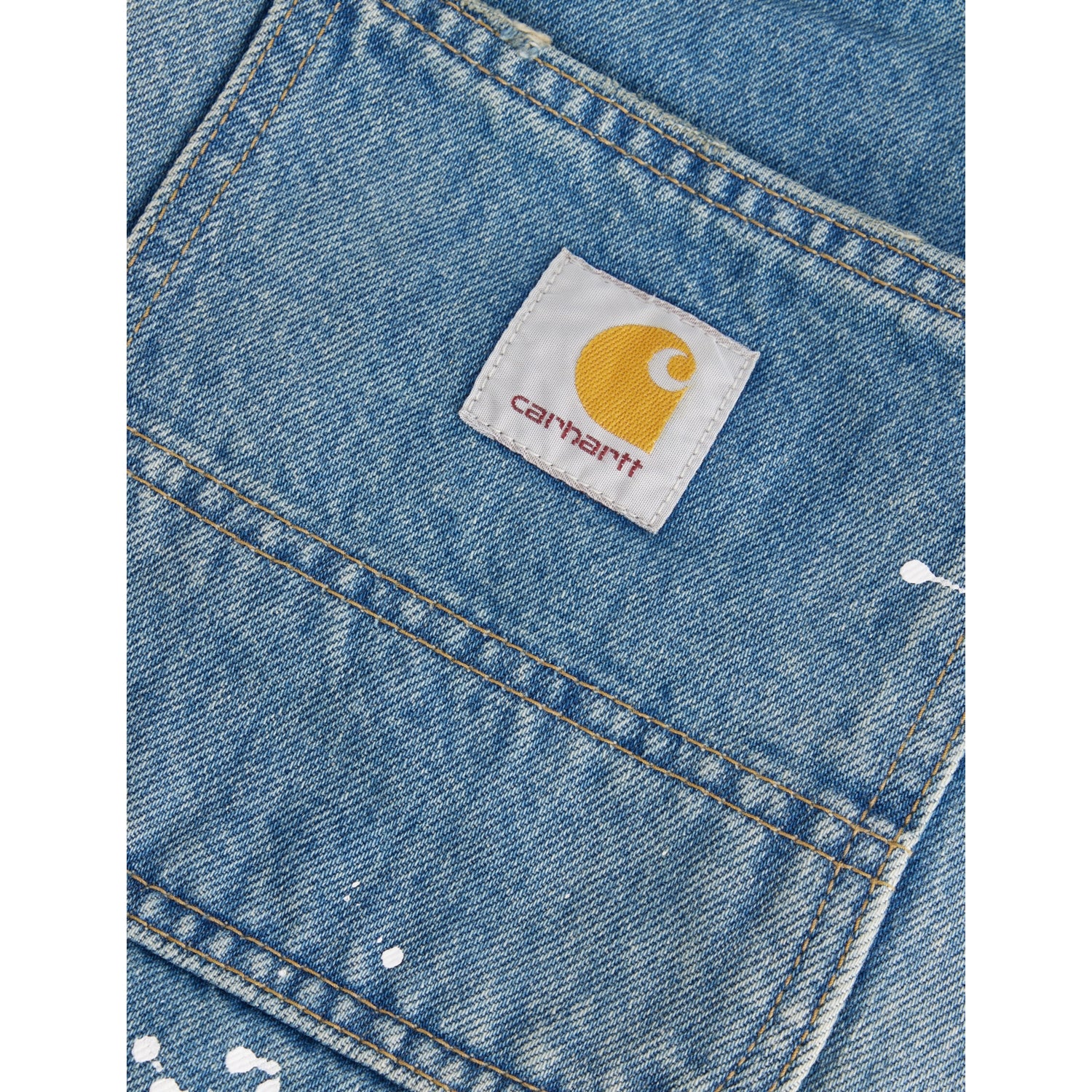 Carhartt WIP logo-patch paint-splatter denim tote, imported from the UK