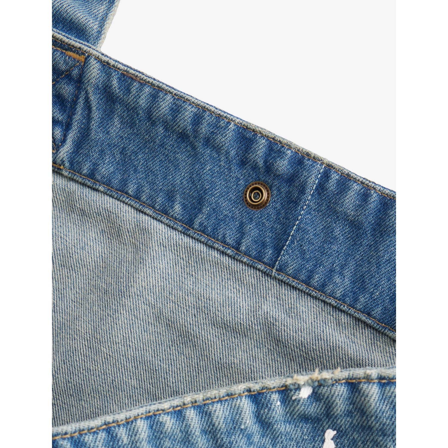 Carhartt WIP logo-patch paint-splatter denim tote, imported from the UK