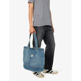 Carhartt WIP paint-splatter denim tote bag, imported from the UK