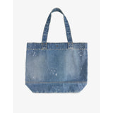 Carhartt WIP paint-splatter denim tote bag, imported from the UK