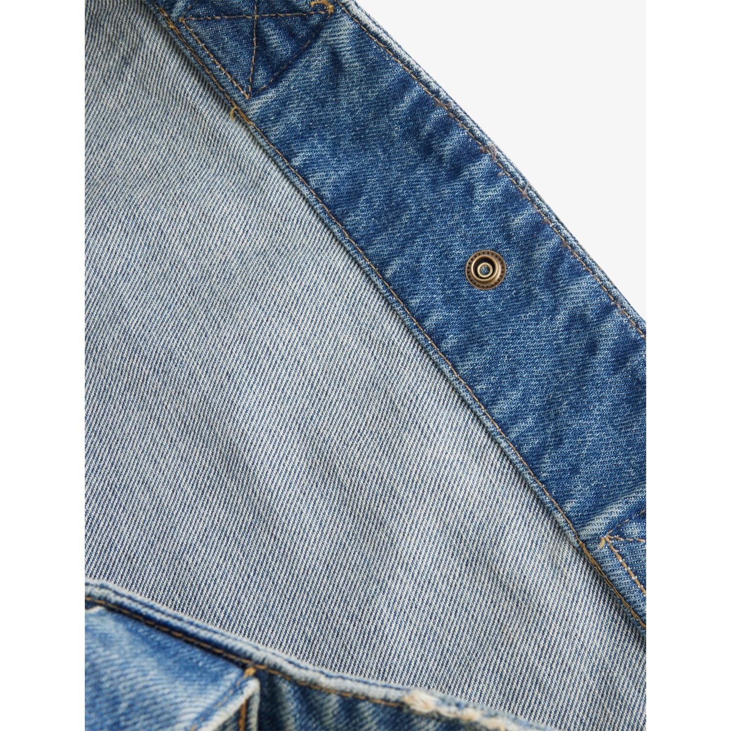 Carhartt WIP paint-splatter denim tote bag, imported from the UK
