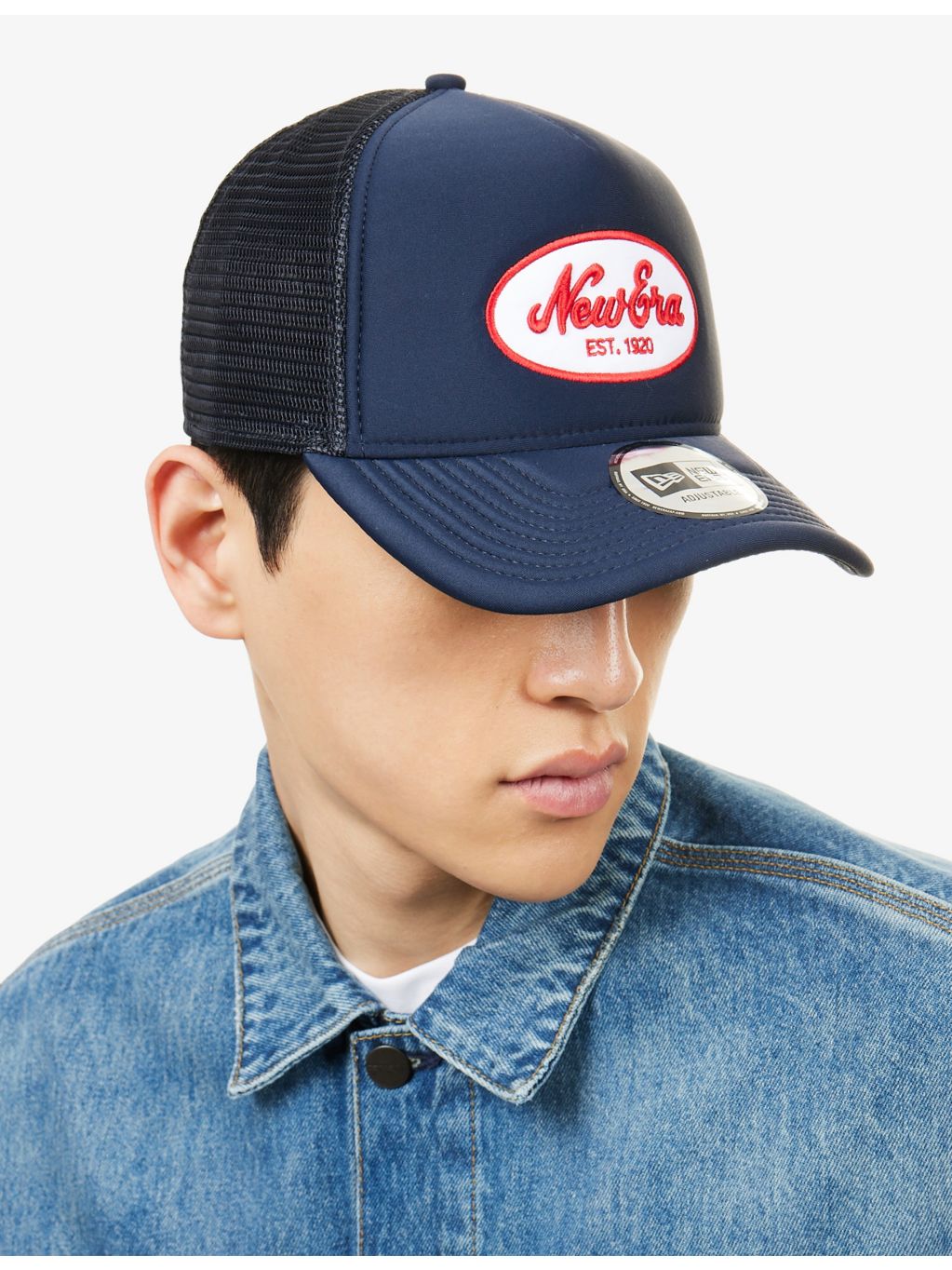 New Era oval logo-patch baseball cap, imported from the UK