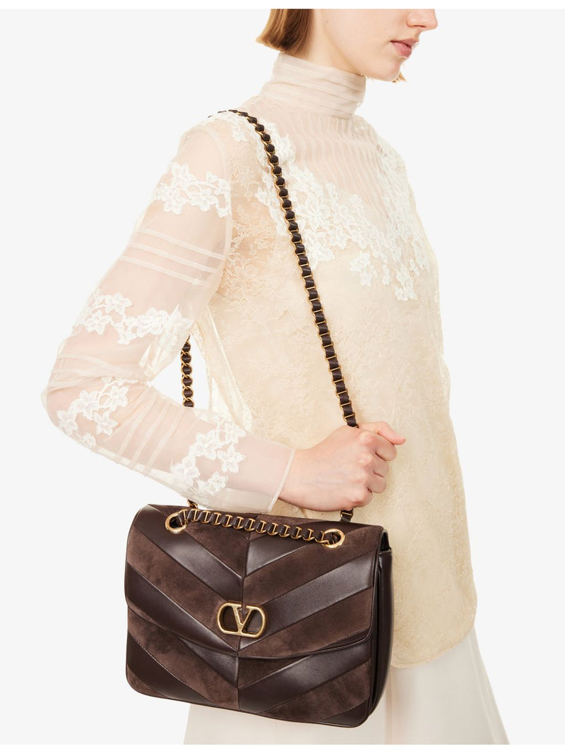 Valentino Garavani Djuna striped suede medium shoulder bag, imported from the UK