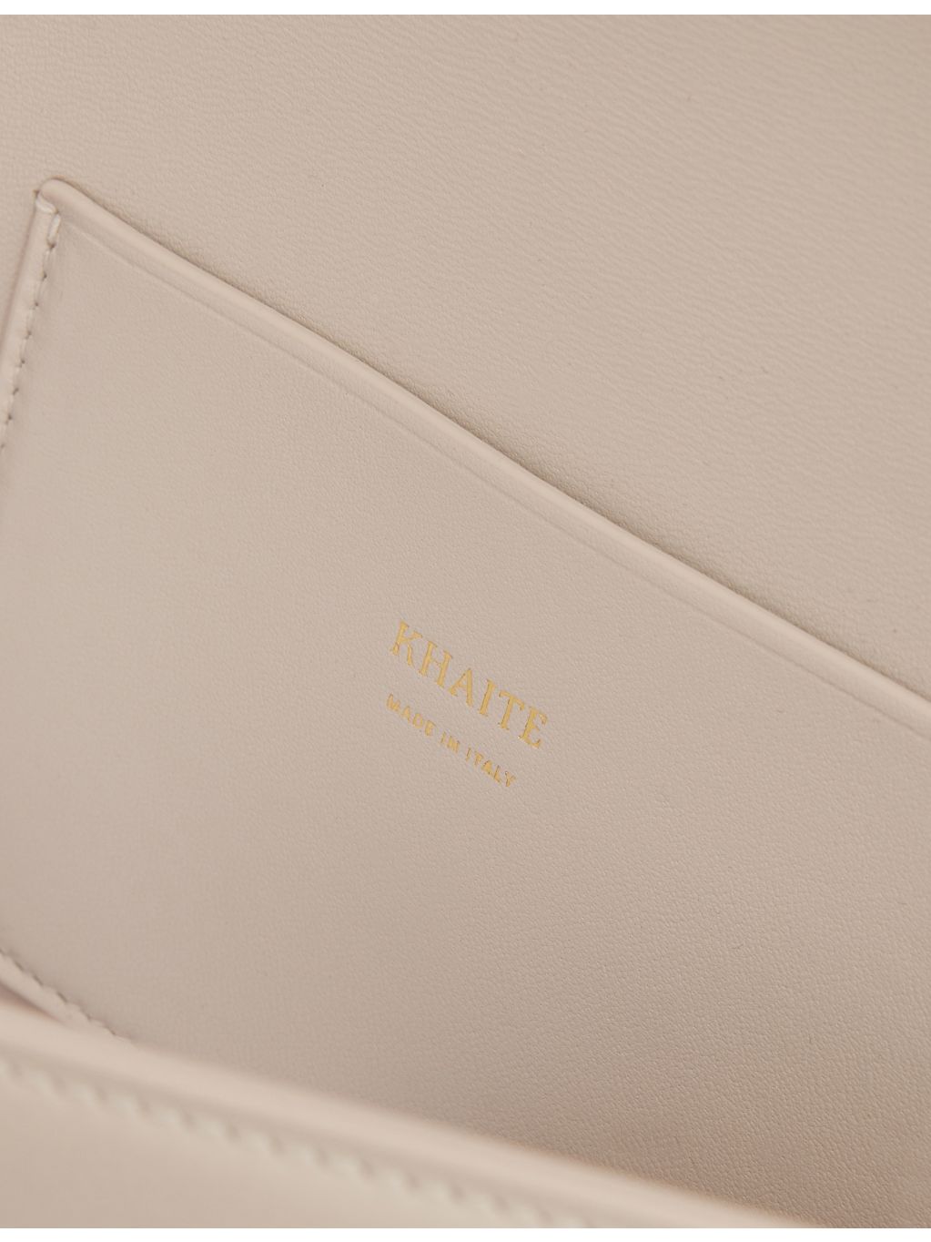 KHAITE Blake leather clutch with front hardware clasp (British brand)