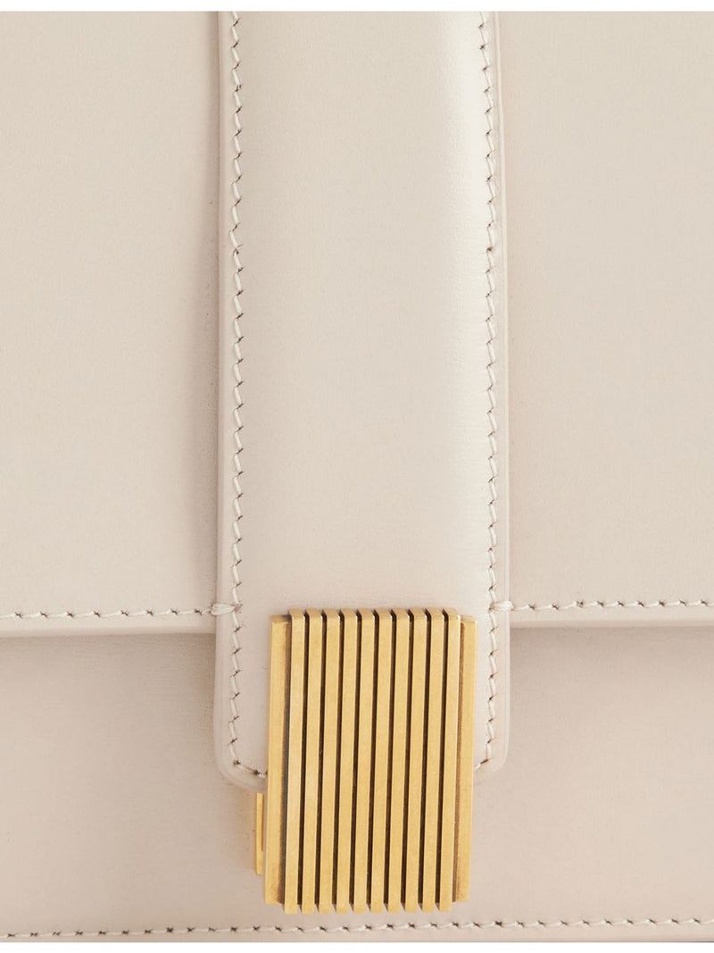 KHAITE Blake leather clutch with front hardware clasp (British brand)