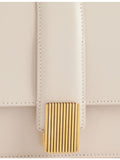 KHAITE Blake leather clutch with front hardware clasp (British brand)