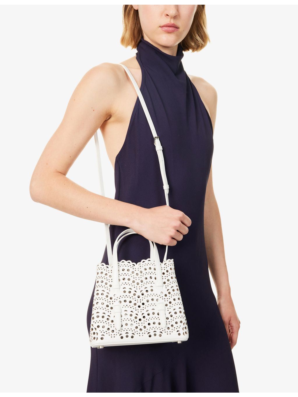 Alaïa Mina 20 laser-cut leather handbag - British product