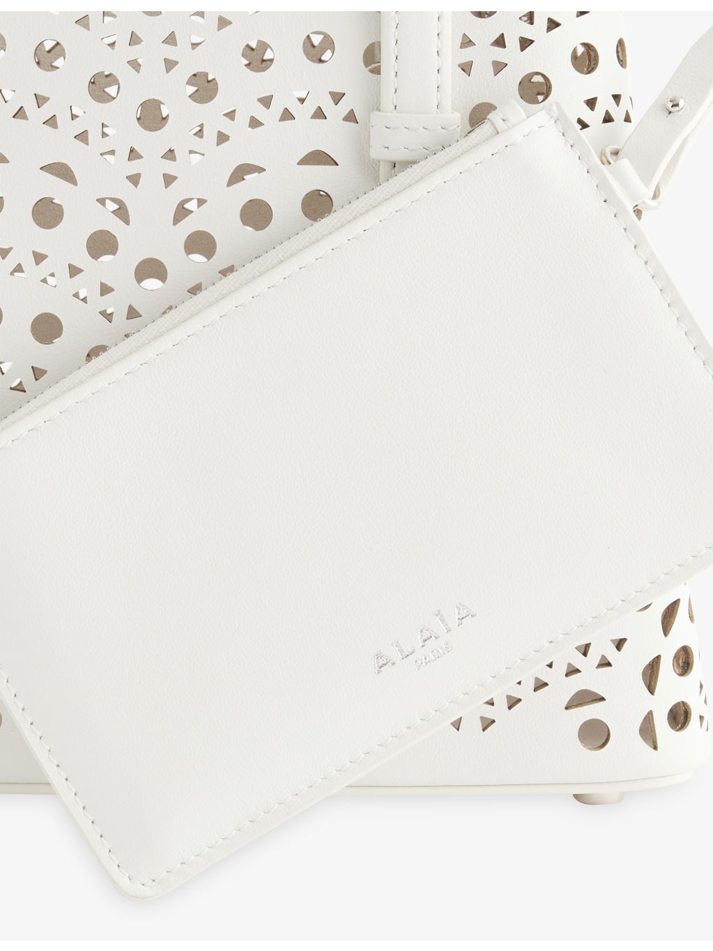 Alaïa Mina 20 laser-cut leather handbag - British product