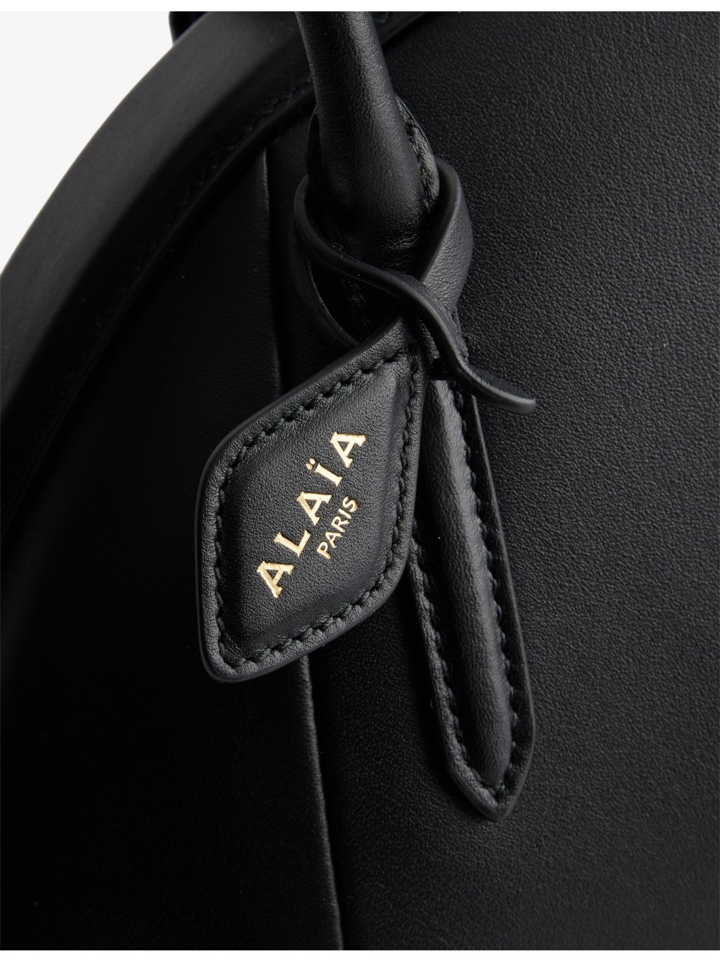 Alaïa small top-handle leather bag - British product