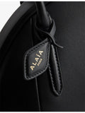 Alaïa small top-handle leather bag - British product