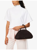 Alaïa small suede top-handle bag with curved shape, UK version