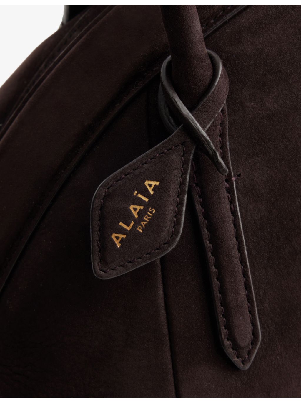 Alaïa small suede top-handle bag with curved shape, UK version
