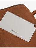 Alaïa small structured suede shoulder bag (British brand)