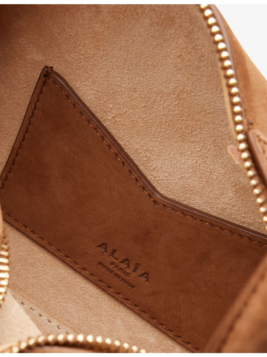 Alaïa small structured suede shoulder bag (British brand)