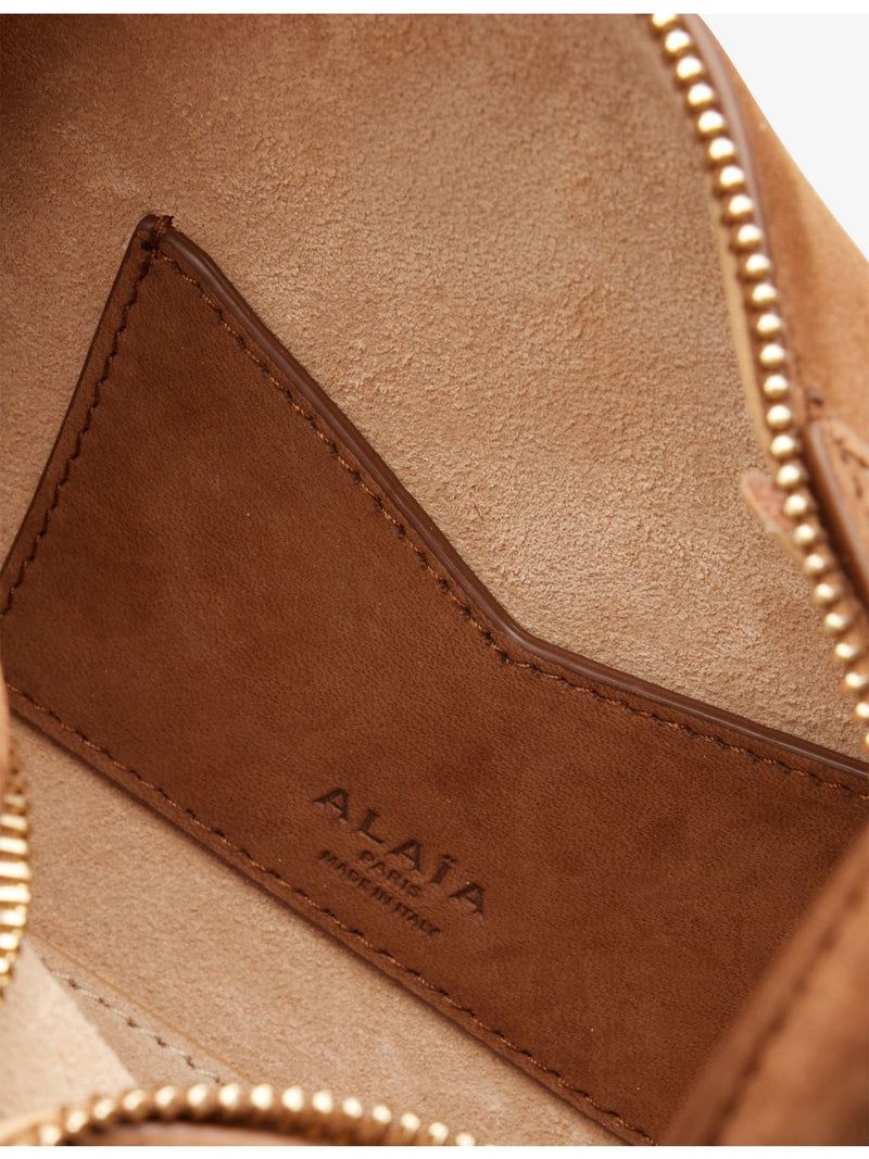 Alaïa small structured suede shoulder bag (British brand)