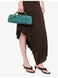 Alaïa suede clutch bag with gold-toned hardware, imported from the UK