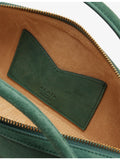 Alaïa suede clutch bag with gold-toned hardware, imported from the UK