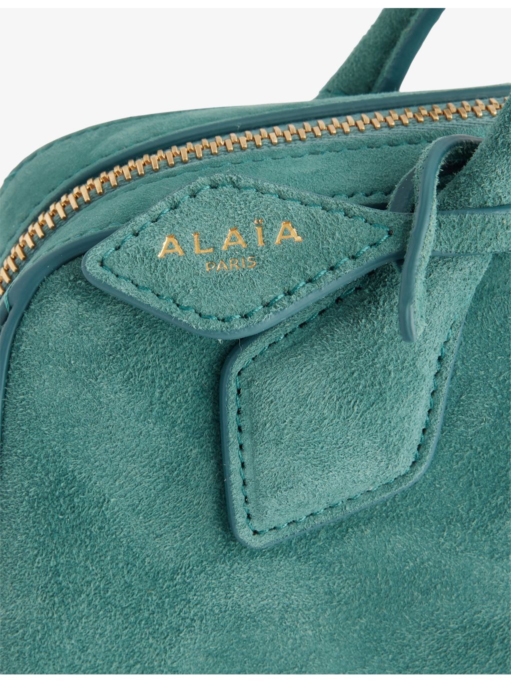 Alaïa suede clutch bag with gold-toned hardware, imported from the UK