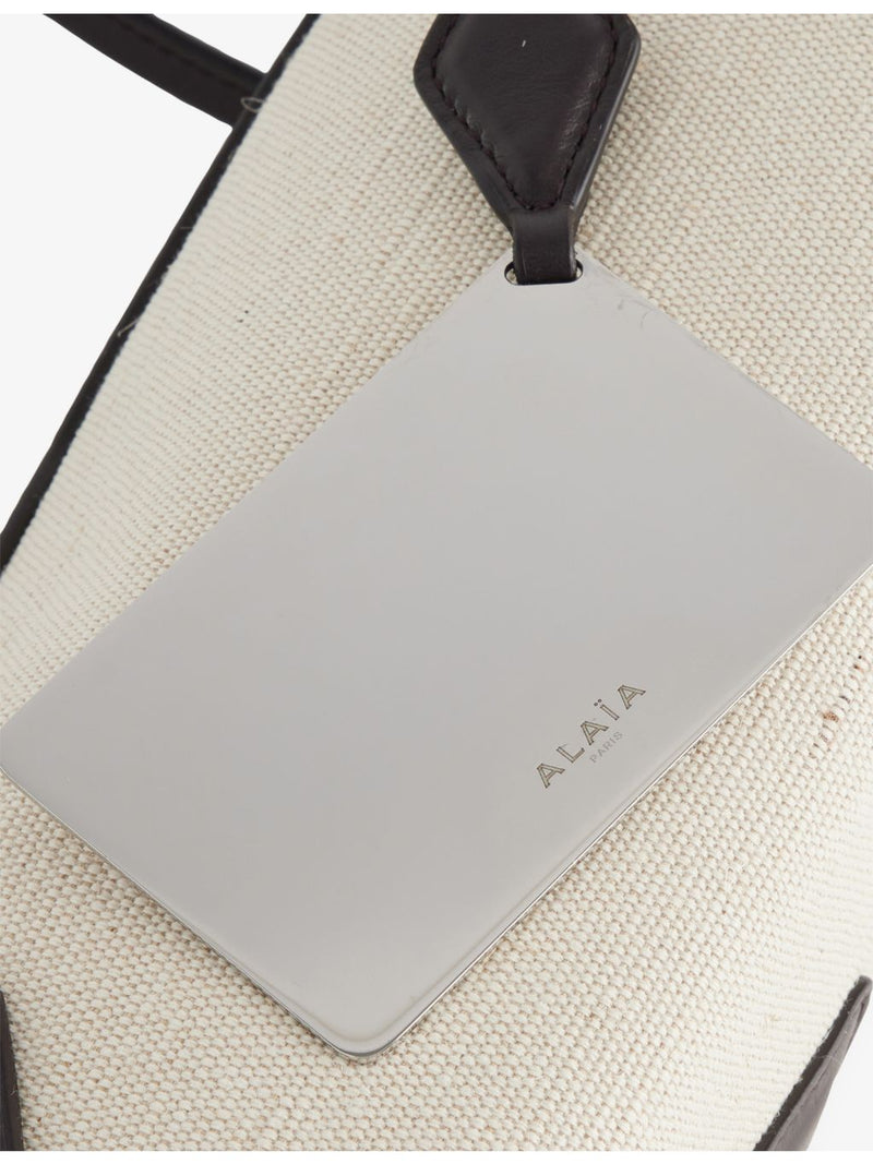 Alaïa Le Teckel medium leather and canvas shoulder bag (British brand)