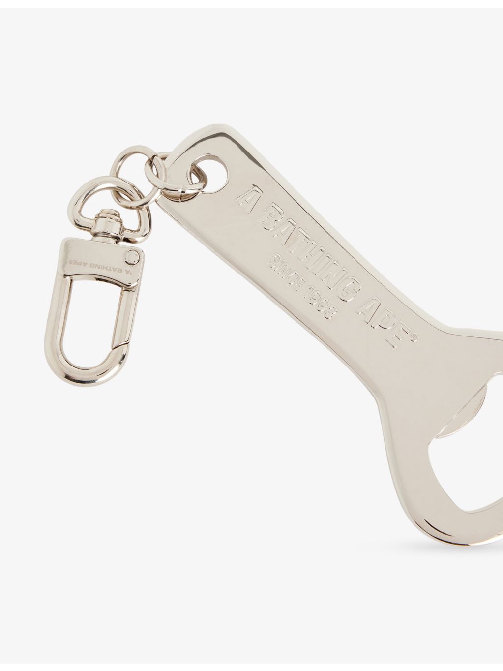 A Bathing Ape camouflage bottle opener, UK version