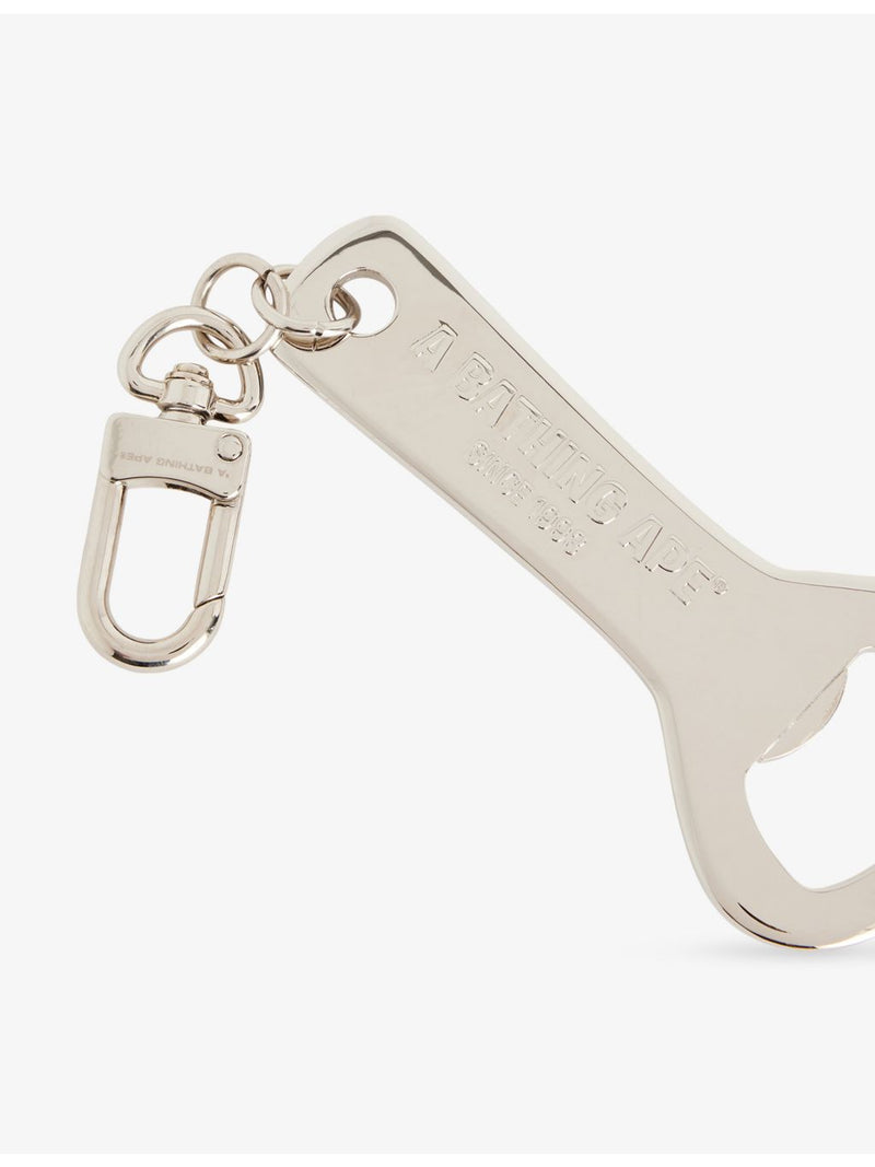 A Bathing Ape camouflage bottle opener, UK version