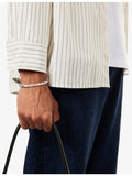 Twojeys silver-plated brass bangle with organic star pattern, imported from the UK