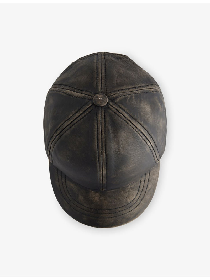 Distressed leather cap with curved peak, imported from the UK