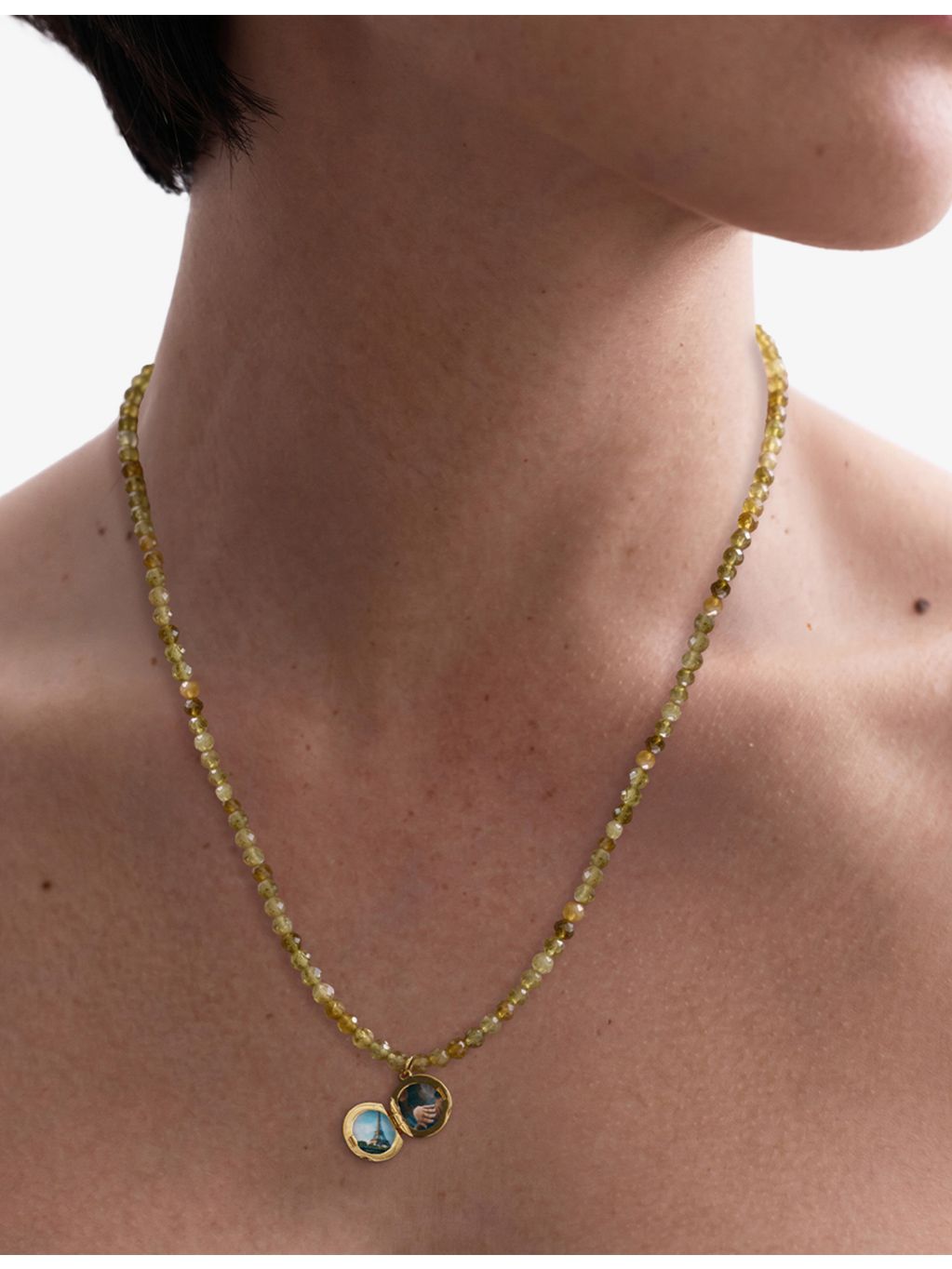 Astley Clarke yellow gold plated locket necklace with green garnet (British brand)