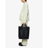 Rains Texel tote backpack with polyurethane coating, imported from the UK