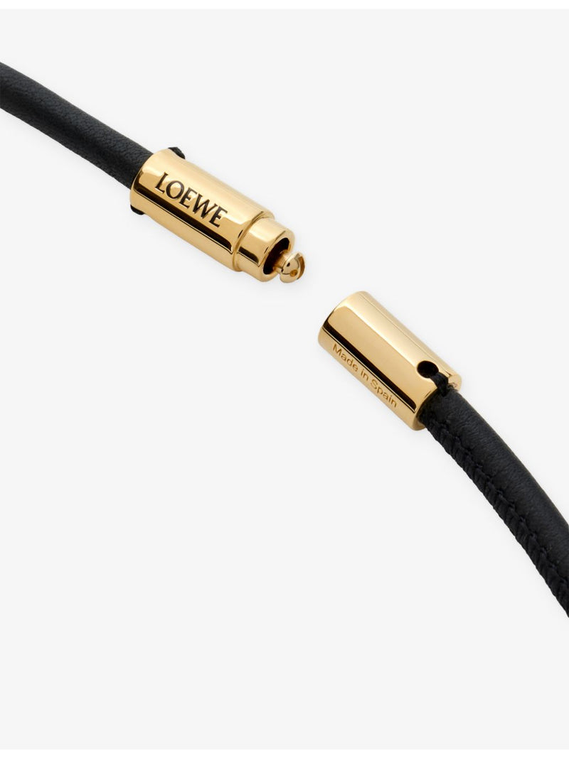 Loewe leather wristlet strap with knotted design and gold hardware, UK version