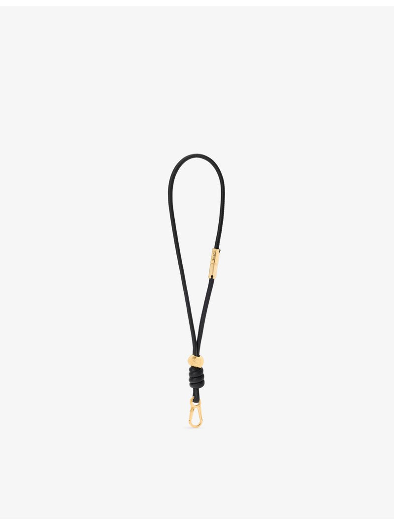 Loewe leather wristlet strap with knotted design and gold hardware, UK version
