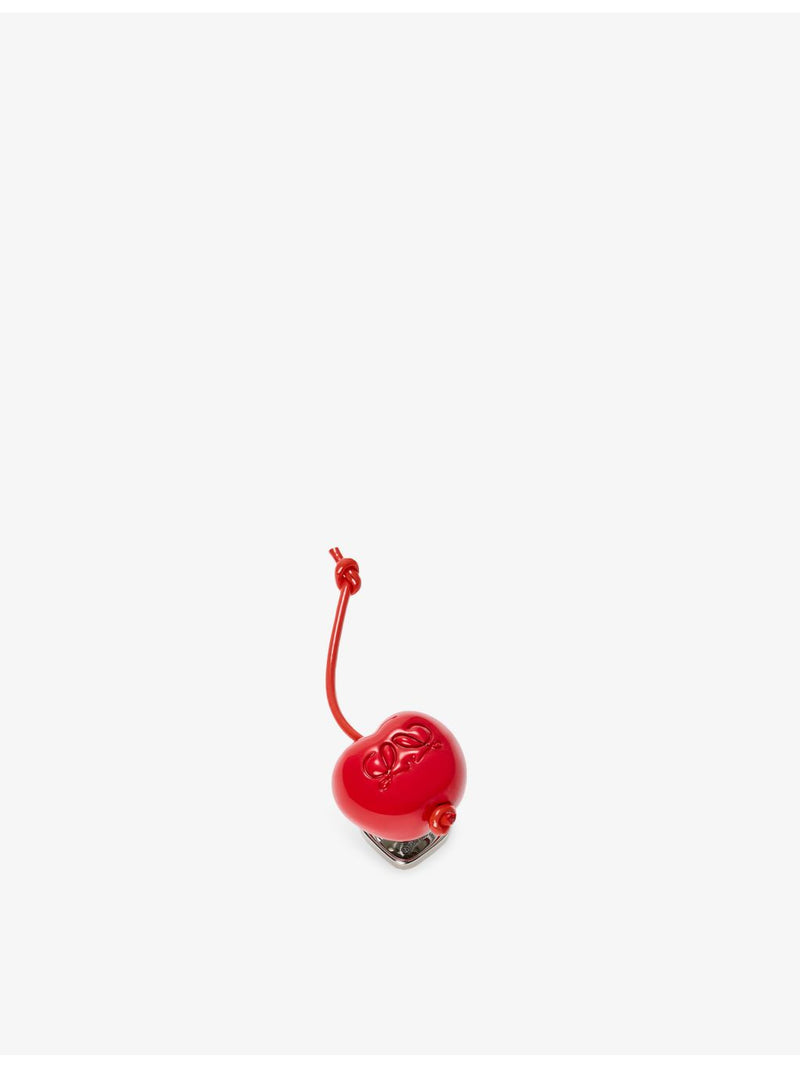 Loewe cherry resin pin with brass and leather, UK version