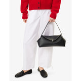 Totême leather shoulder bag with T-Lock logo, imported from the UK