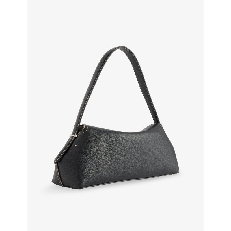 Totême leather shoulder bag with T-Lock logo, imported from the UK