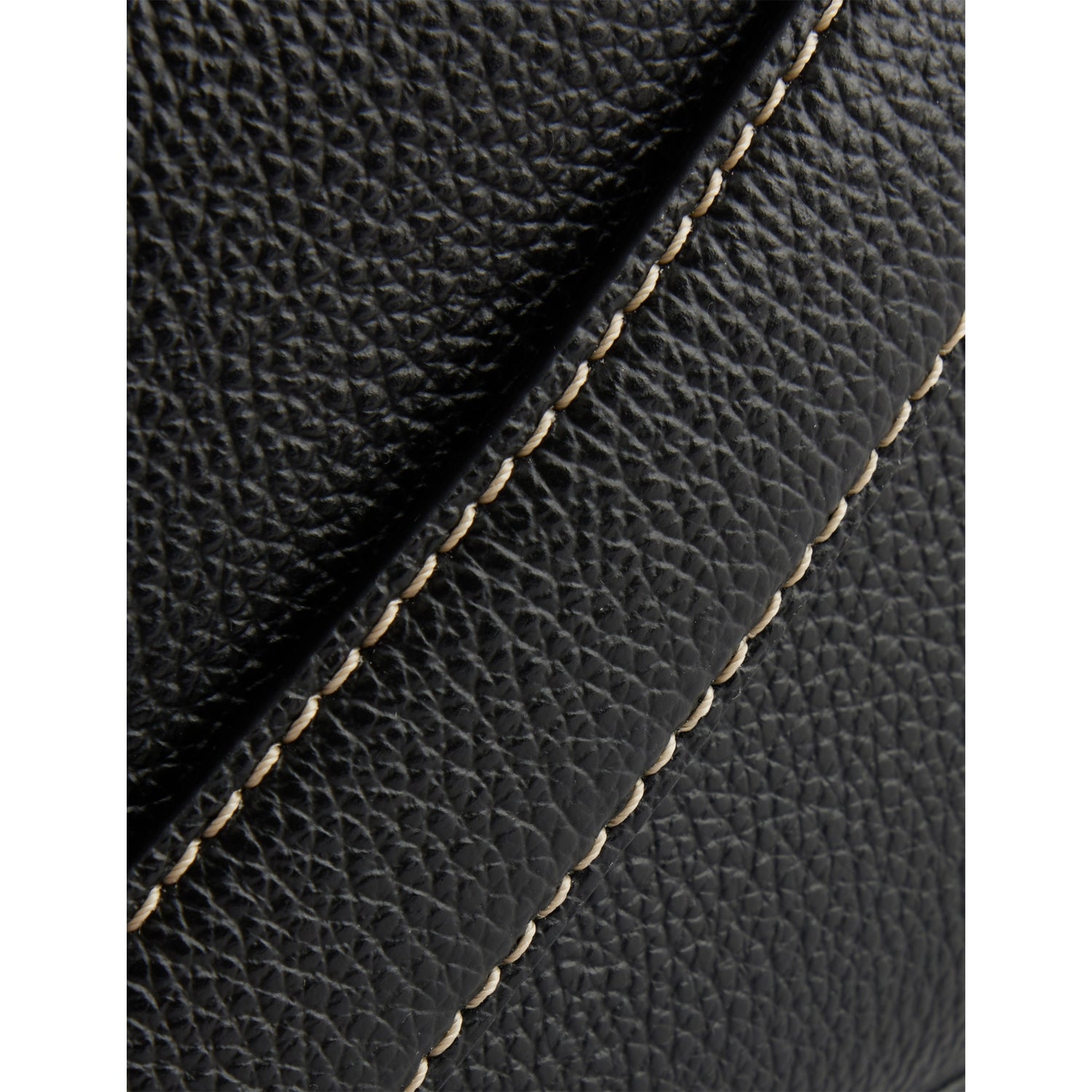 Totême leather shoulder bag with T-Lock logo, imported from the UK