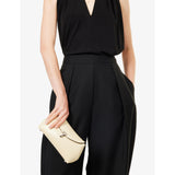 Totême mini T-Lock leather clutch bag, imported from the UK