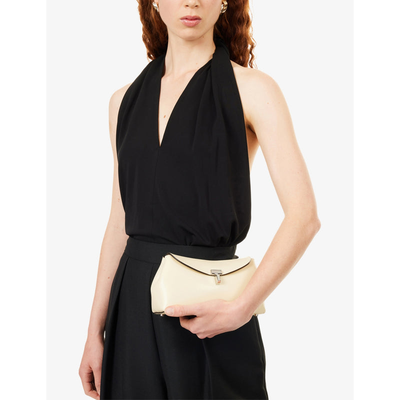 Totême mini T-Lock leather clutch bag, imported from the UK