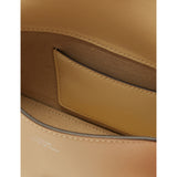Totême mini T-Lock leather clutch bag, imported from the UK