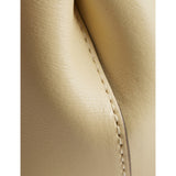 Totême mini T-Lock leather clutch bag, imported from the UK