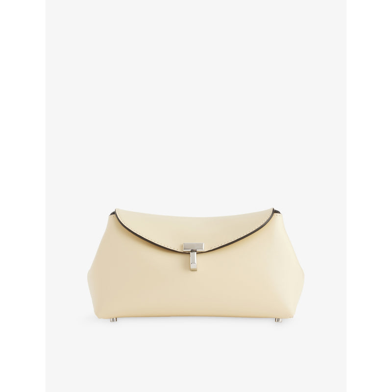 Totême mini T-Lock leather clutch bag, imported from the UK